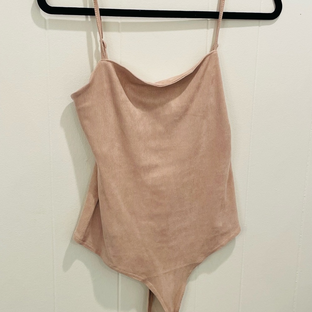 The pants store blush body suit size large